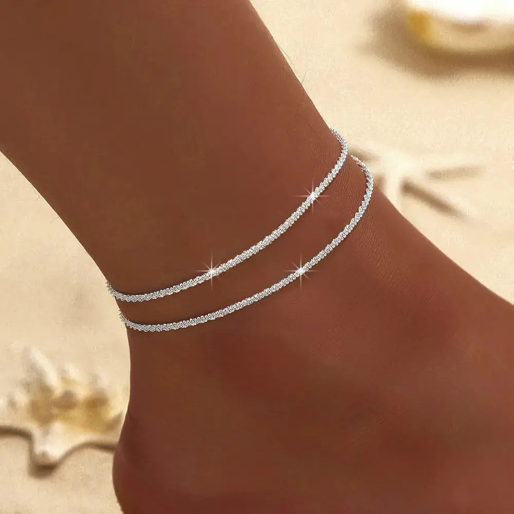 Fashionable women's double layer silver & gold anklet. Perfect elegant accessory for summer jewelry.