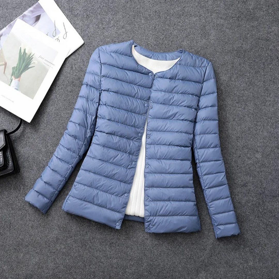 Stylish women's zippered lightweight down puffer jacket. Ideal for fall fashion, winter warmth & everyday comfort.
