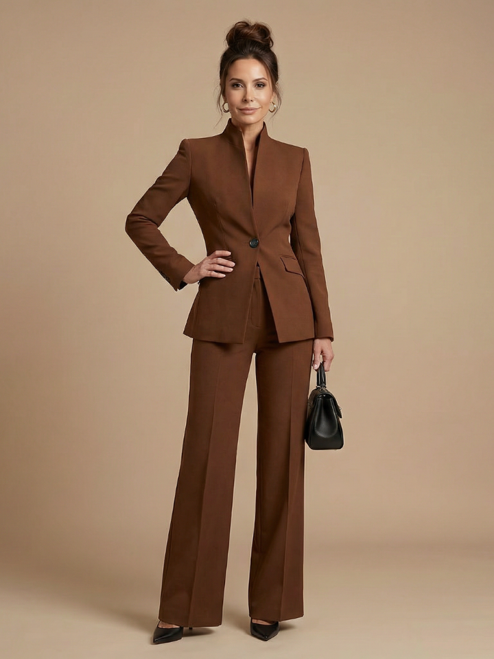 Formal women's tailored suit set for business, with a stand collar jacket & elegant flared pants.