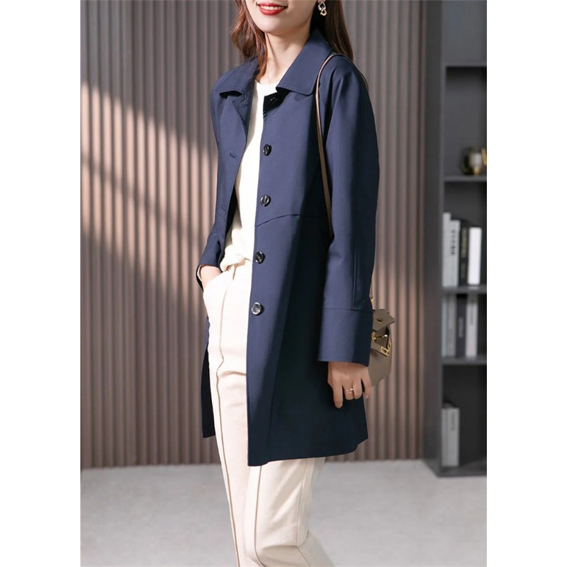 Sophisticated long trench coat for women, classic design with an elegant tied waist.