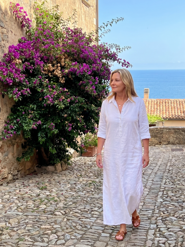 Stylish women's long sleeve relaxed fit maxi dress, featuring a sophisticated collar & functional button front.