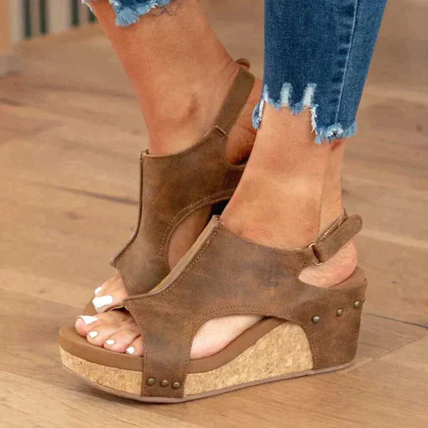 Stylish slip-on women's comfort sandals, ergonomically designed for foot support & versatile summer fashion.