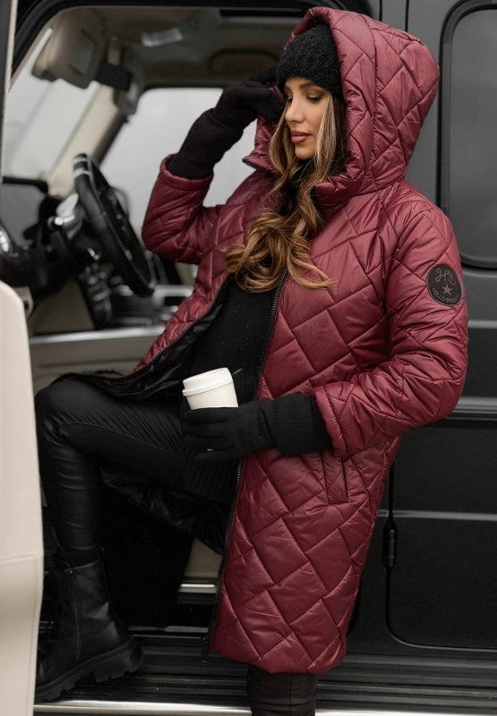 Warm women's diamond quilted jacket with hood, ideal stylish outerwear for cold weather.