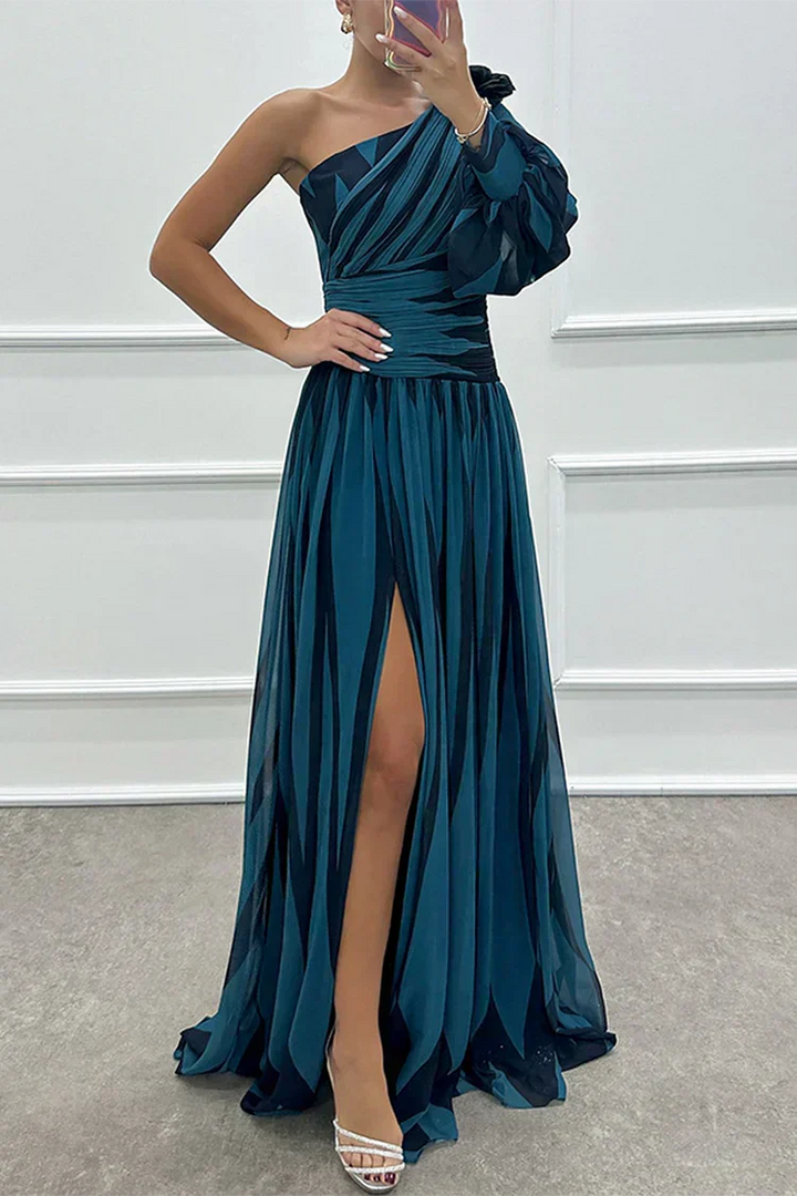 Sophisticated striped one-shoulder maxi dress for women with a side slit. An elegant long party dress.