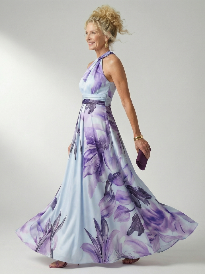 Vibrant light floral maxi dress with a halter neck. Women's comfortable and elegant spring/summer fashion.