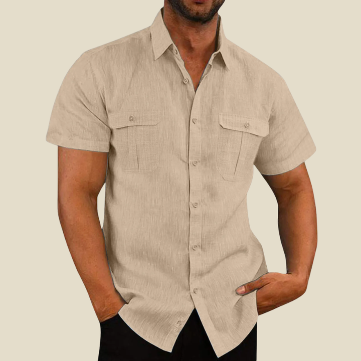 Men's casual relaxed fit short-sleeve shirt with dual chest pockets, perfect for versatile smart-casual summer outfits.