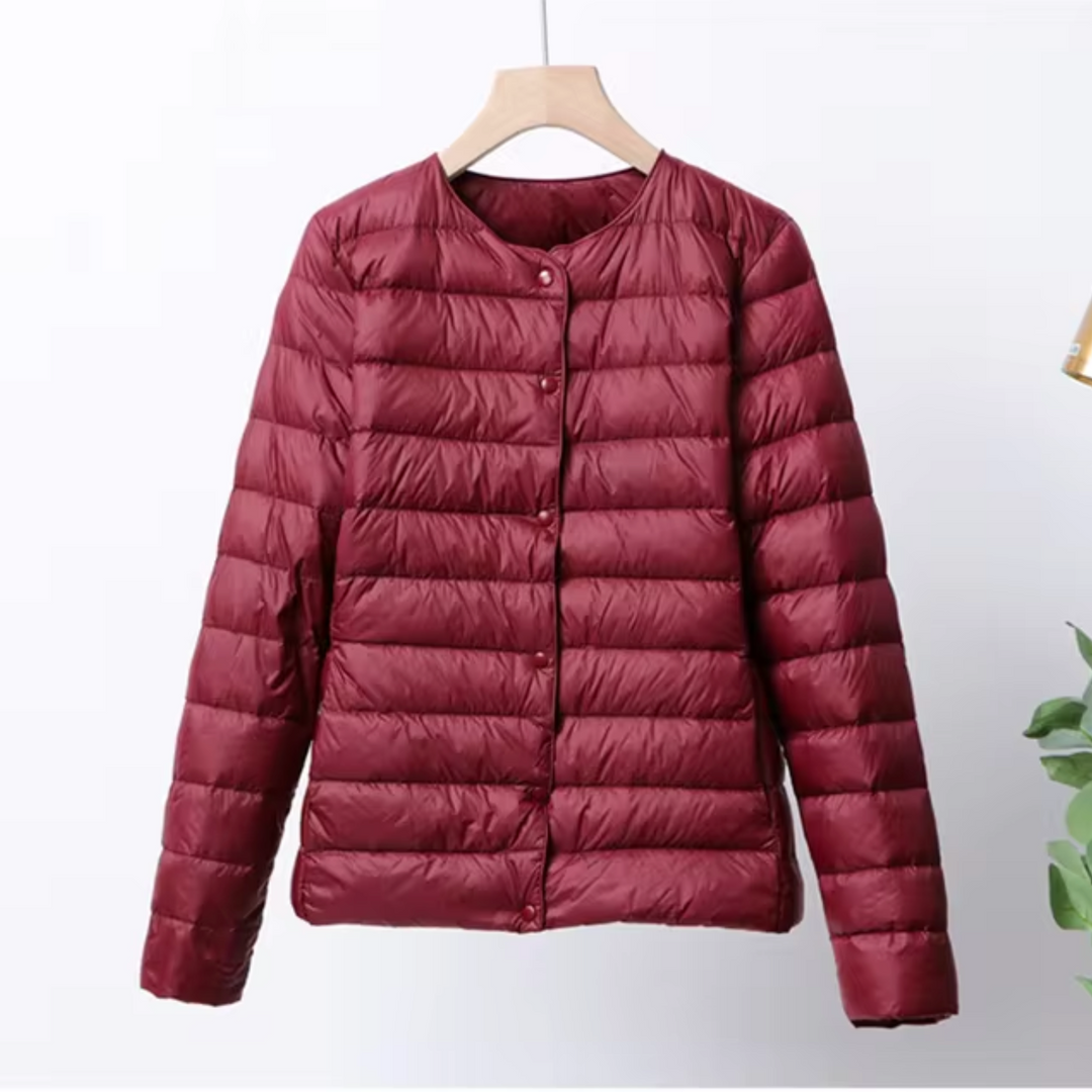 Casual yet elegant women's ultrathin puffer jacket. Insulated & lightweight for versatile fall & spring wear.