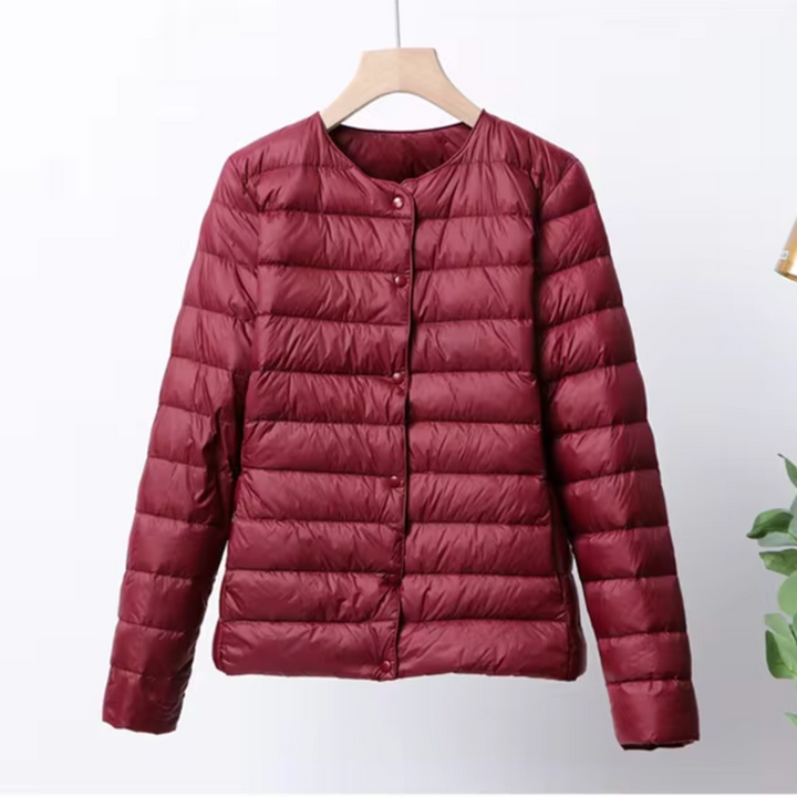 Casual yet elegant women's ultrathin puffer jacket. Insulated & lightweight for versatile fall & spring wear.