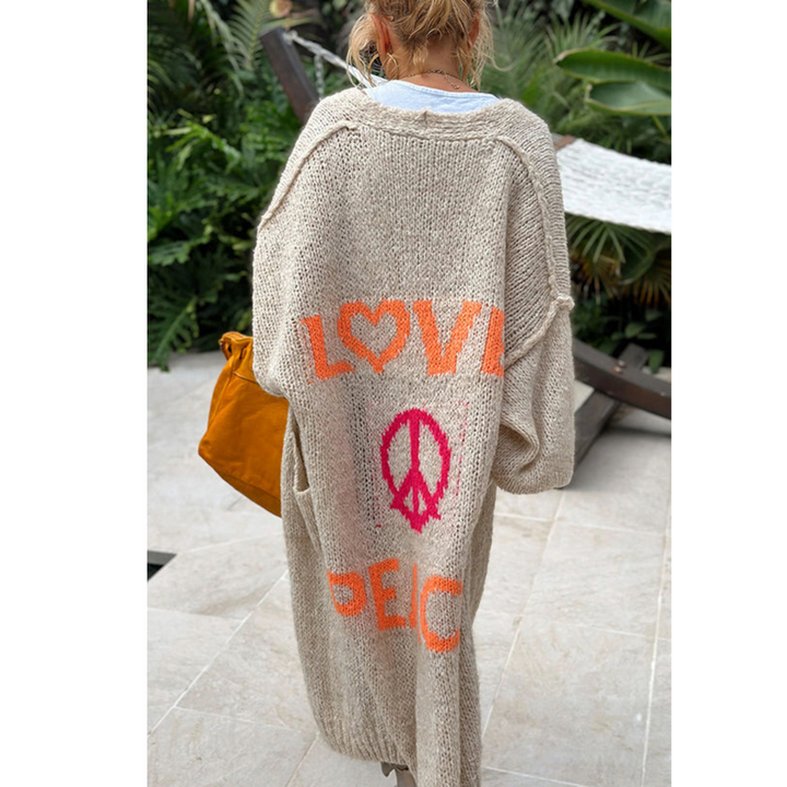 Versatile women's peace cardigan. Hippie style, long sleeve, perfect for layering casual or festival outfits.