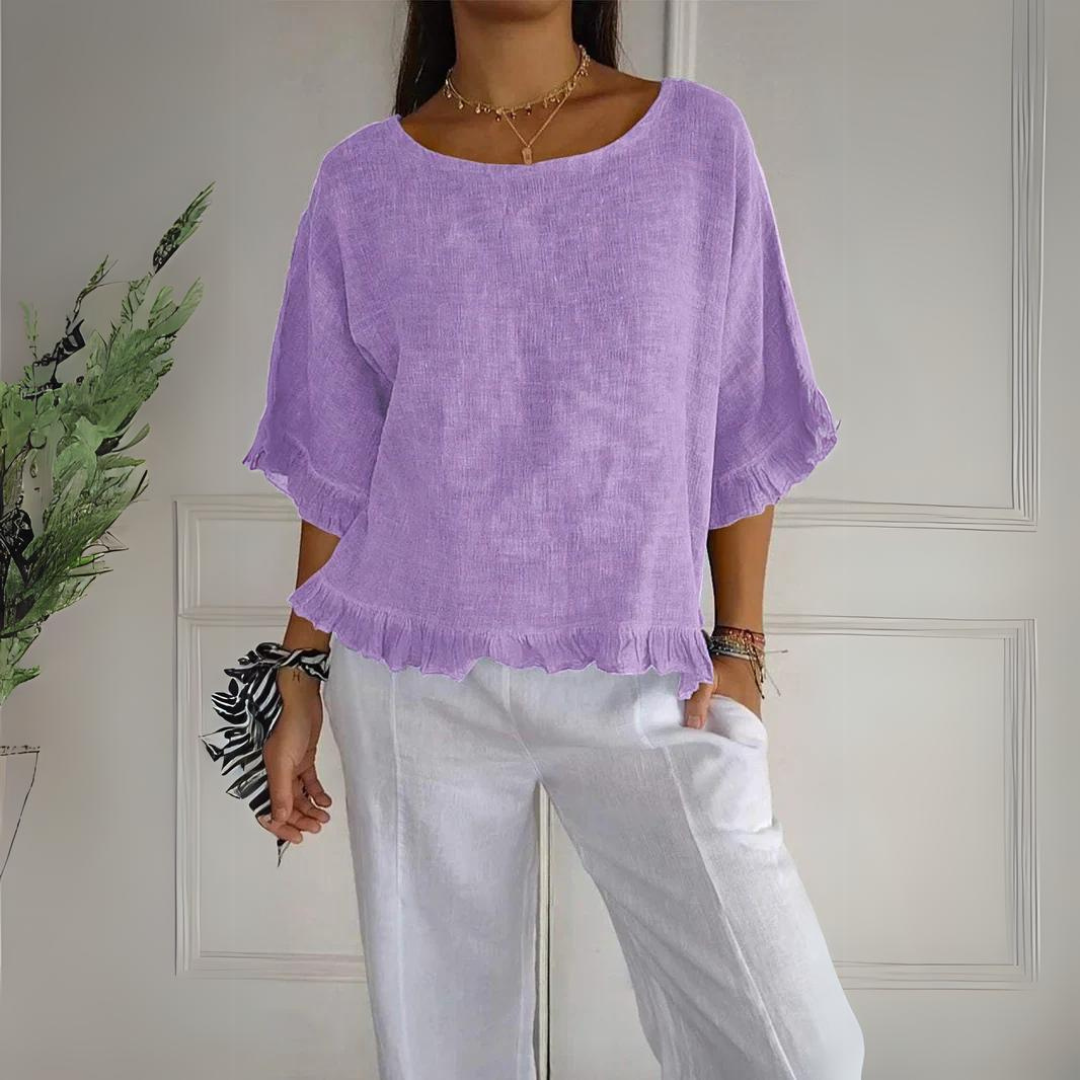 Women's elegant ruffle blouse for everyday wear or special occasions. Stylish, comfortable, and versatile fashion.