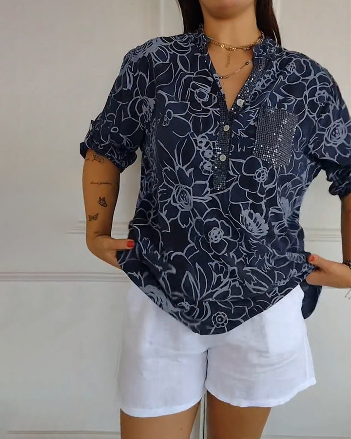 Spring style women's floral blouse, a comfortable relaxed fit top for elegant summer outfits.