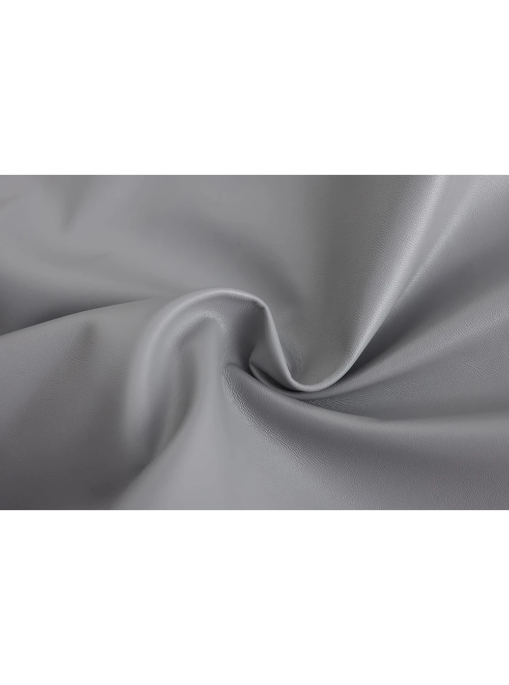 Close-up of elegant men's overcoat lapels, showing classic design and quality fabric.