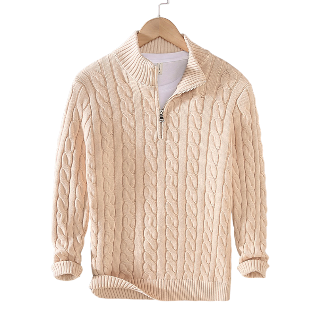 Close-up of a men's refined cable knit quarter zip sweater, highlighting the textured design and stand collar.