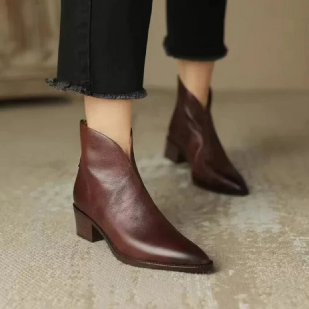 Pair of elegant brown ankle boots, ready for versatile fall fashion and winter comfort.