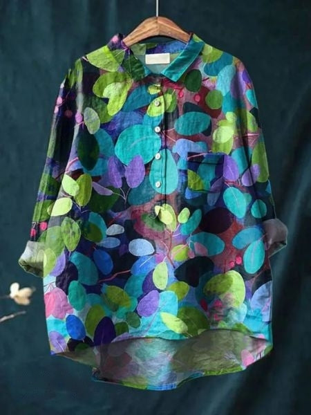 Back view of a women's floral print long sleeve button-up blouse, stylish & versatile.