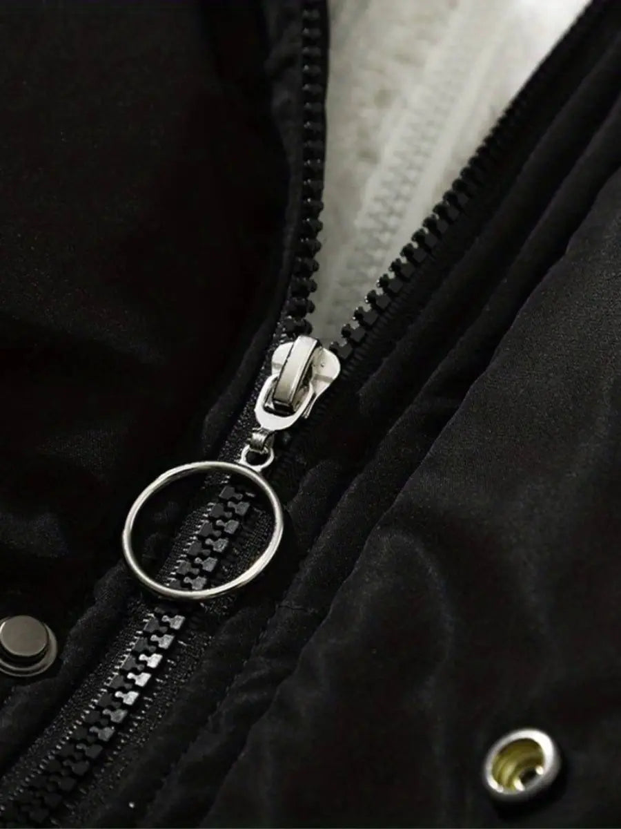 Stylish women's winter jacket, a comfortable puffer with a cozy plush hood for cold weather travel.