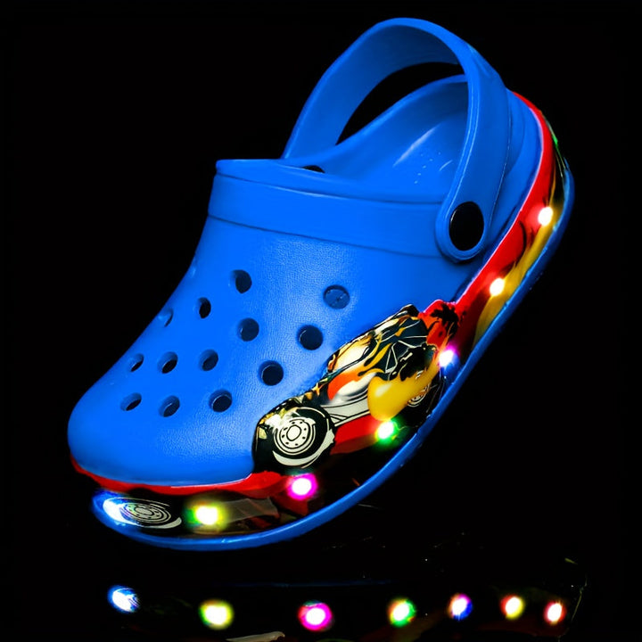 Durable kids' glow-in-the-dark clogs. Anti-slip, breathable summer footwear for beach and water play.