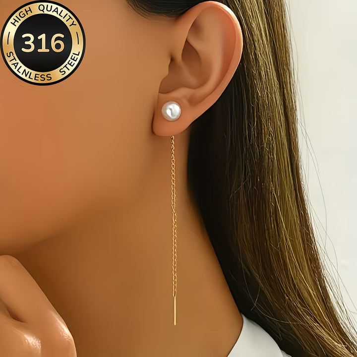 Sophisticated women's long tassel pearl earrings. Elegant dangle fashion accessory for any occasion.