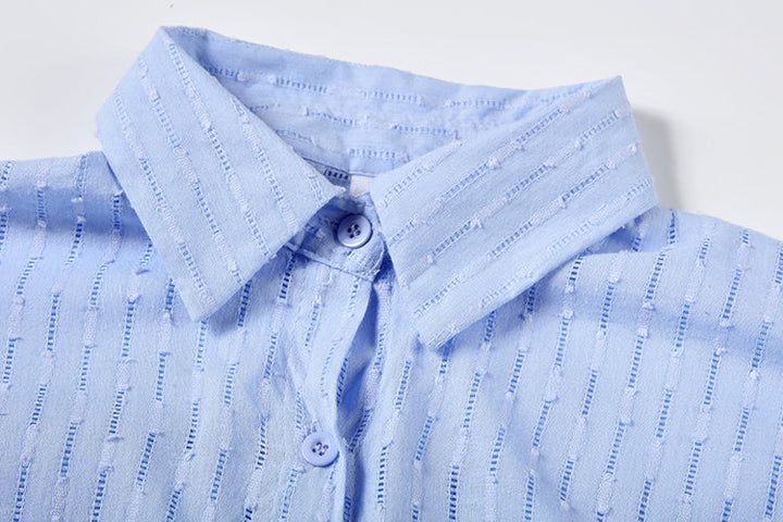 Comfortable women's broderie short set, including an oversized top and flowy matching shorts.
