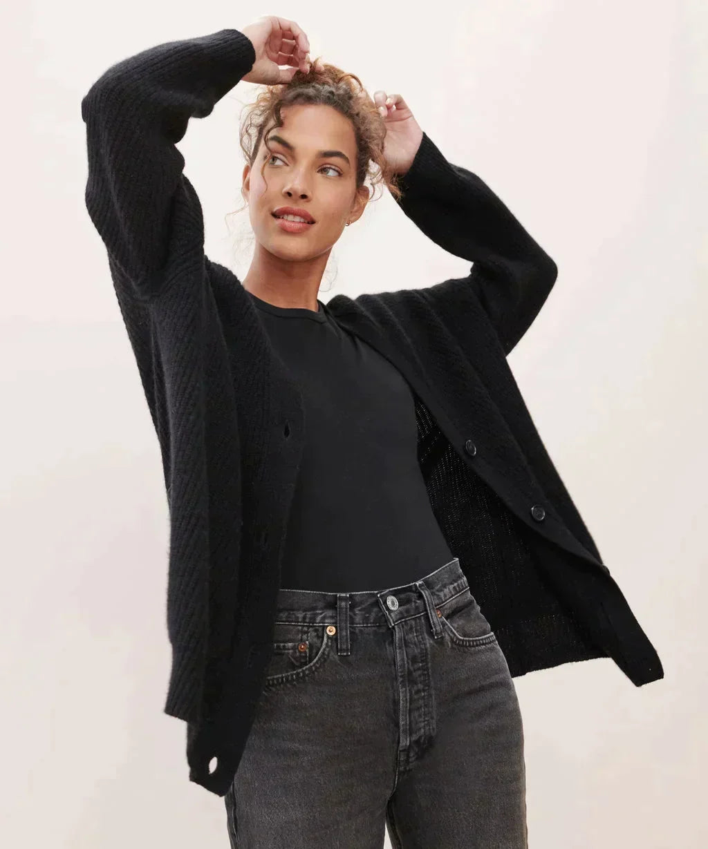 Comfortable women's knit cardigan with a classic design, an essential elegant layering piece.