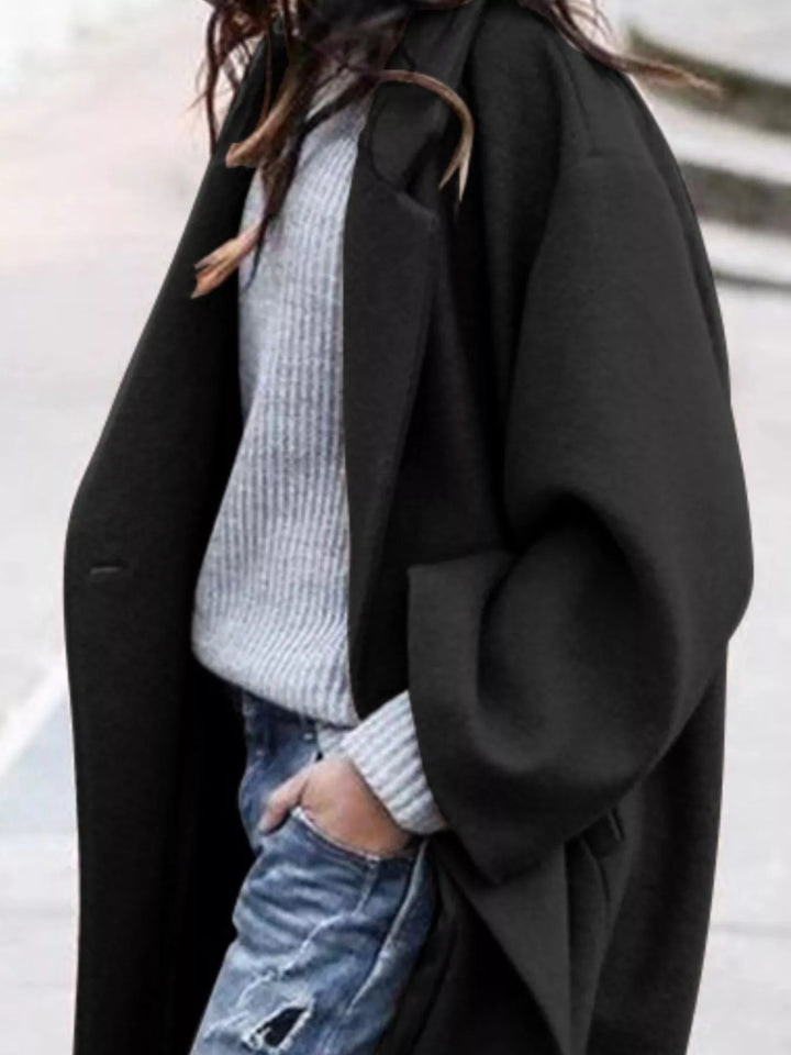 Stylish long khaki oversized women's coat, designed for comfort and versatile winter outerwear.