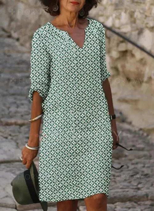 Women's flowy casual summer midi dress for effortless comfort. Perfect day dress for vacation wear.