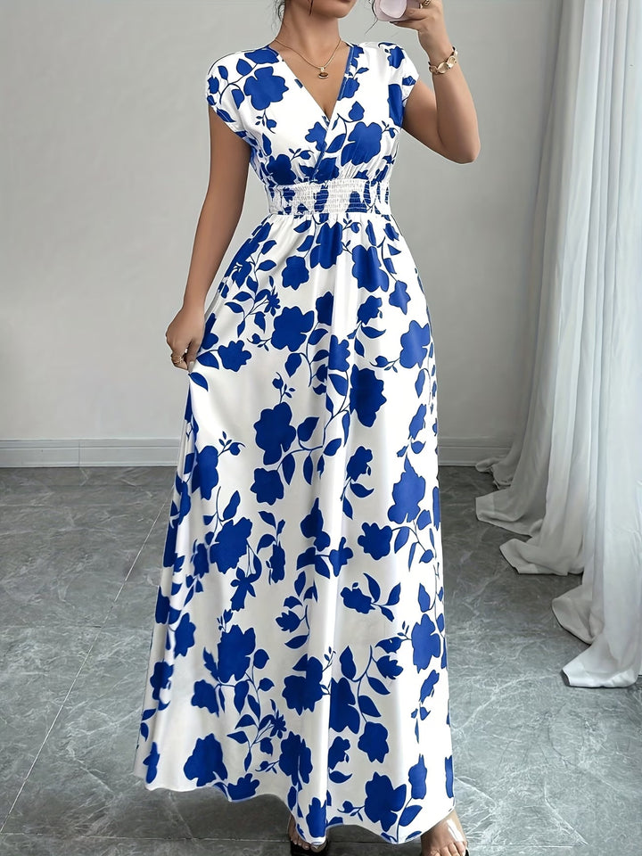 Women's elegant sleeveless V-neck summer dress. A versatile black midi for chic casual looks.