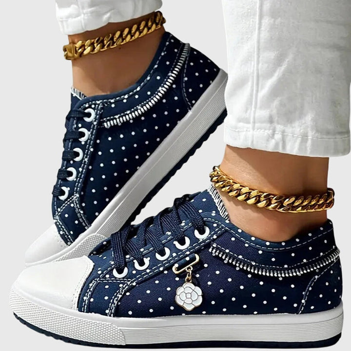 Casual women's orthopedic sneakers featuring a wide toe box & arch support for foot pain relief.