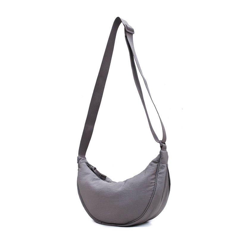 Secure Half Moon Crossbody Bag, women's purse with zipper closure for safe keeping.