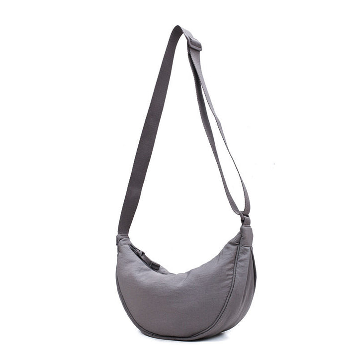 Secure Half Moon Crossbody Bag, women's purse with zipper closure for safe keeping.