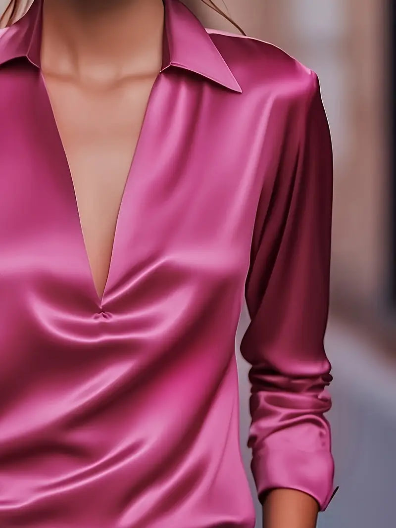 Comfortable women's long sleeve V-neck blouse. Collared design for easy styling, maintaining an elegant look.