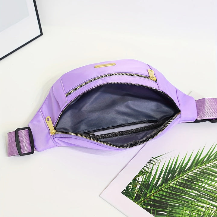 Stylish women's lightweight fanny pack, multi-zip pockets & adjustable strap for convenient travel.