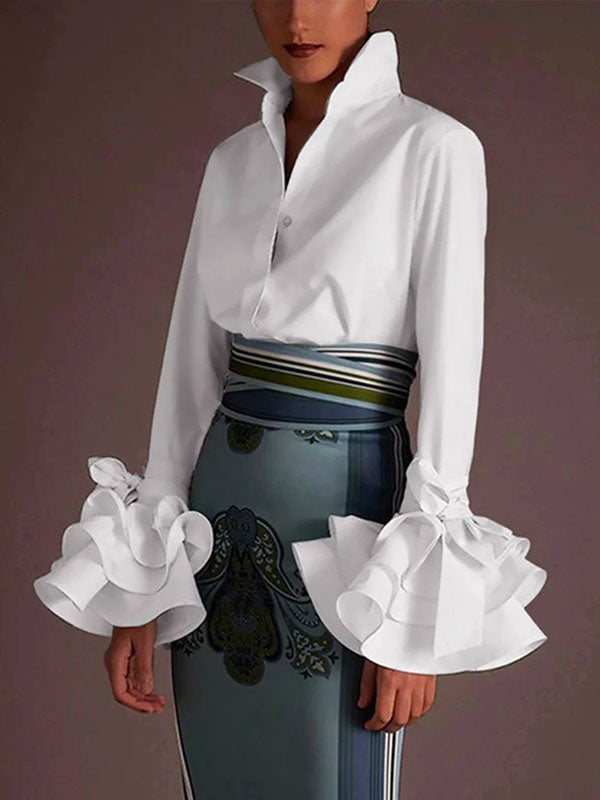 Spring/Summer women's tiered ruffle blouse. Elegant button-up top with flare sleeves, chic & feminine.