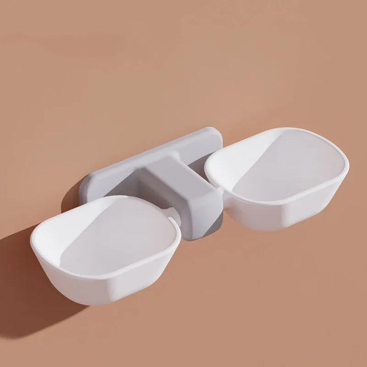 Stylish wall-mounted elevated pet bowls. Keeps feeding area neat, suitable for any pet-friendly kitchen.
