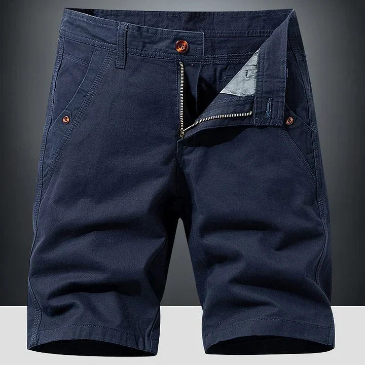 Comfortable men's relaxed chino shorts in navy for summer. Versatile and stylish casual warm weather attire.