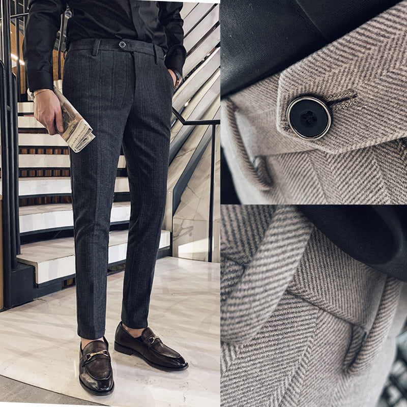Stylish men's tailored dress pants, slim-fit herringbone design for a smart casual or formal office look.