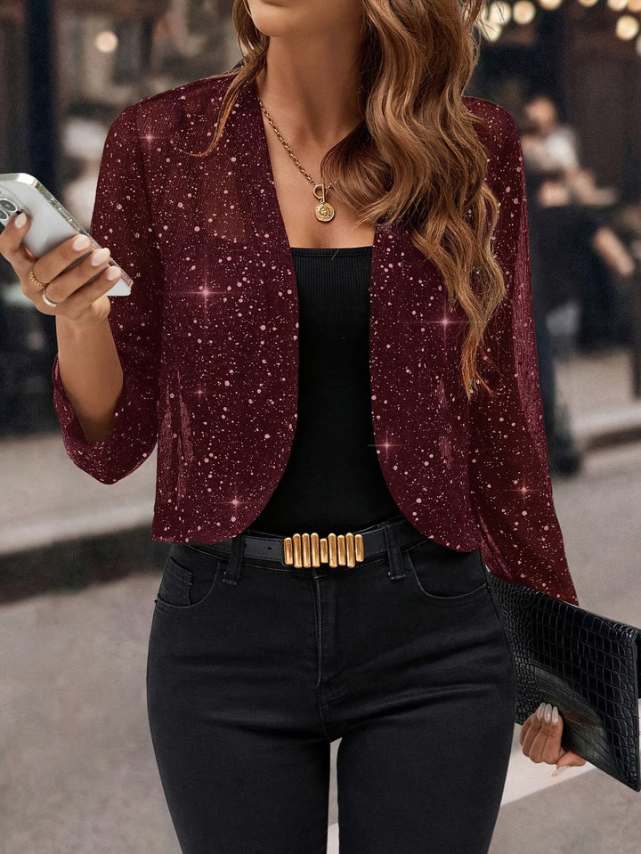 Elegant women's sparkling sequin cardigan, perfect for layering & adding glamour to any outfit.