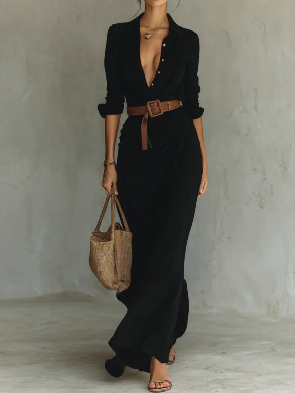 Black women's long sleeve wrap style belted maxi dress. Sophisticated & versatile for elegant fall/winter fashion.