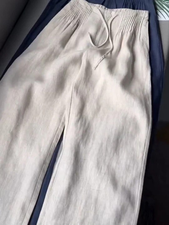 Women's flowy wide-leg trousers, comfortable relaxed fit & elegant style for all seasons.