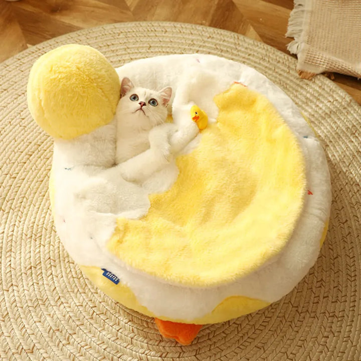 Interactive Cat Bed: Cute duck bed with play arch for ultimate comfort & engaging playtime relaxation. Washable pet furniture.
