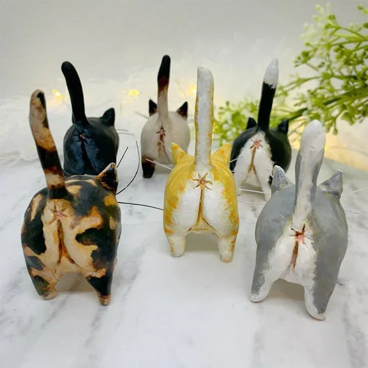 Lovely handmade feline ornament, bringing holiday cheer to any Christmas tree. A unique pet gift.