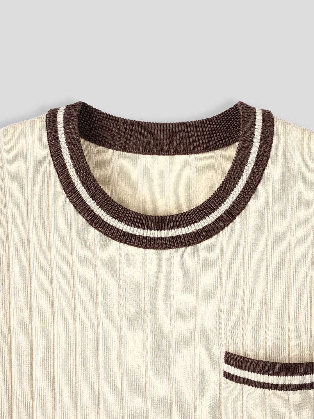 Classic men's ribbed knit short-sleeve polo, casual, everyday wear, with distinctive striped trim.