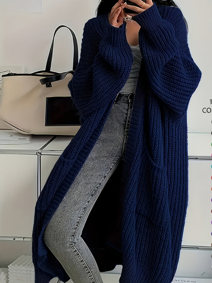 Soft knit V-neck button-front cardigan sweater, showcasing its luxurious, cosy texture.