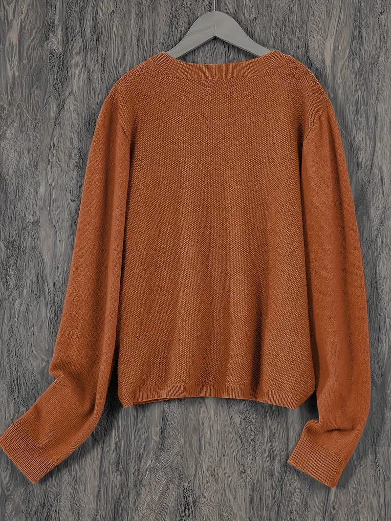 Casual women's sweater, a cozy knitwear cardigan for versatile fall fashion.