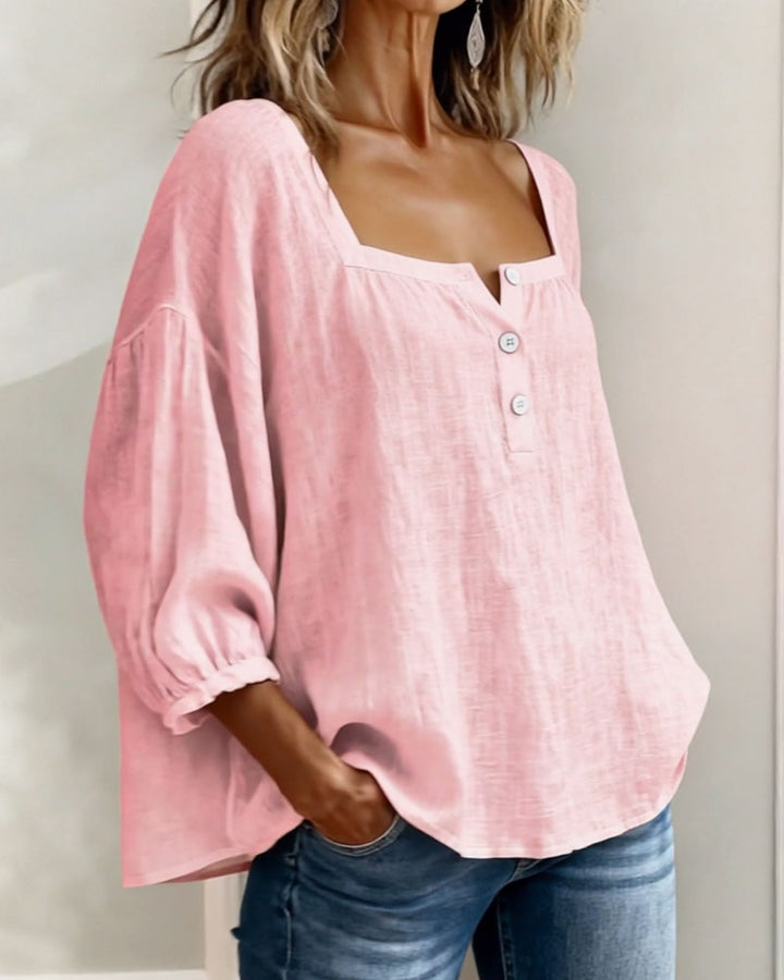 Chic women's puff sleeve top, relaxed fit, perfect for spring/summer fashion.