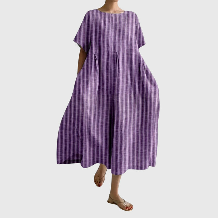 Effortless women's striped long maxi dress. Casual elegance, perfect for comfortable summer and spring style.