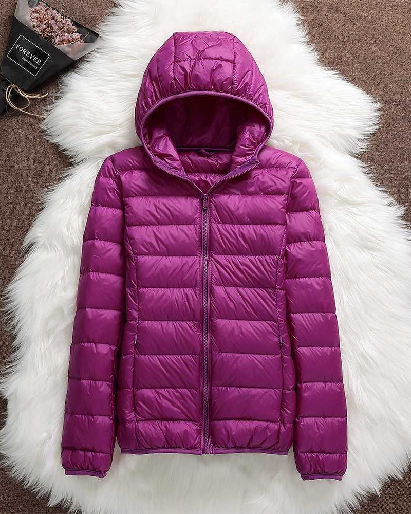 Women's lightweight waterproof jacket. High-performance outerwear for all-weather protection and active comfort.