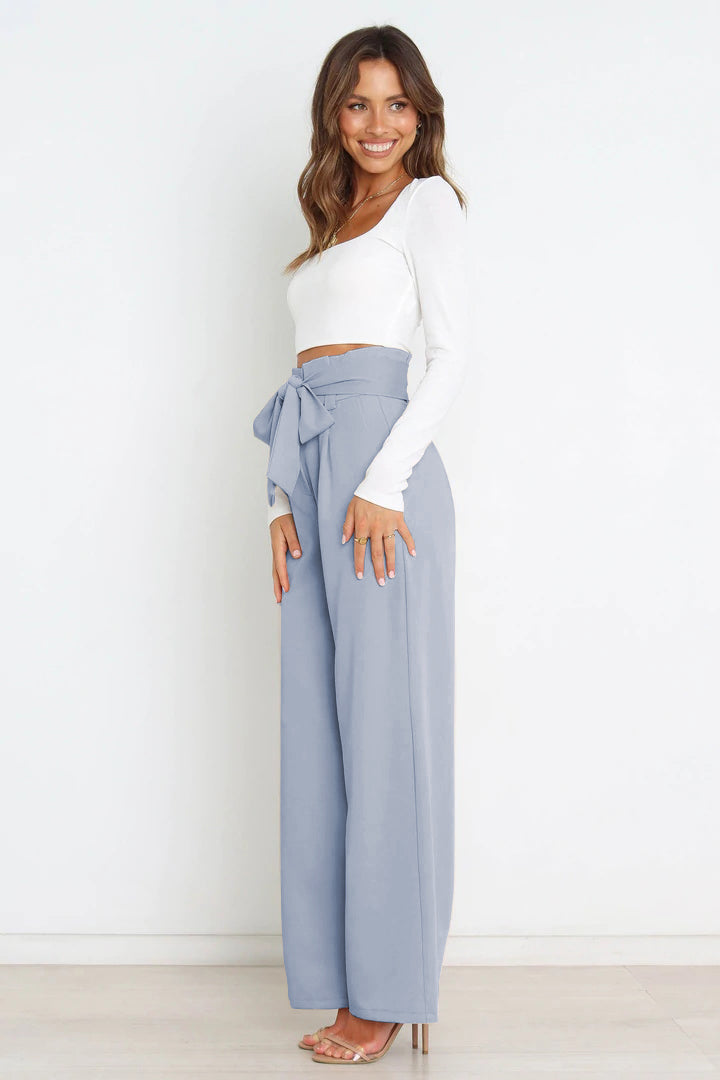 Summer-ready women's high waist paperbag trousers, wide leg and a trendy bow.