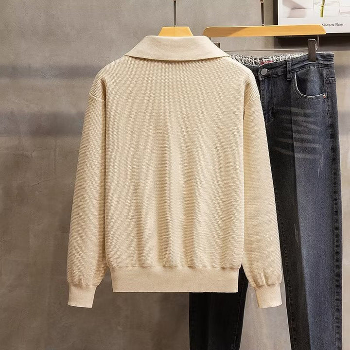 Versatile men's long sleeve polo sweater, ribbed knit, ideal for smart casual or relaxed autumn fashion.