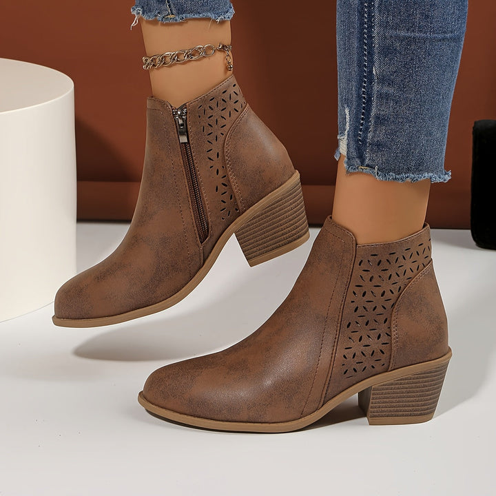 Front view of comfortable women's orthopaedic boots, highlighting their sleek design and supportive features.